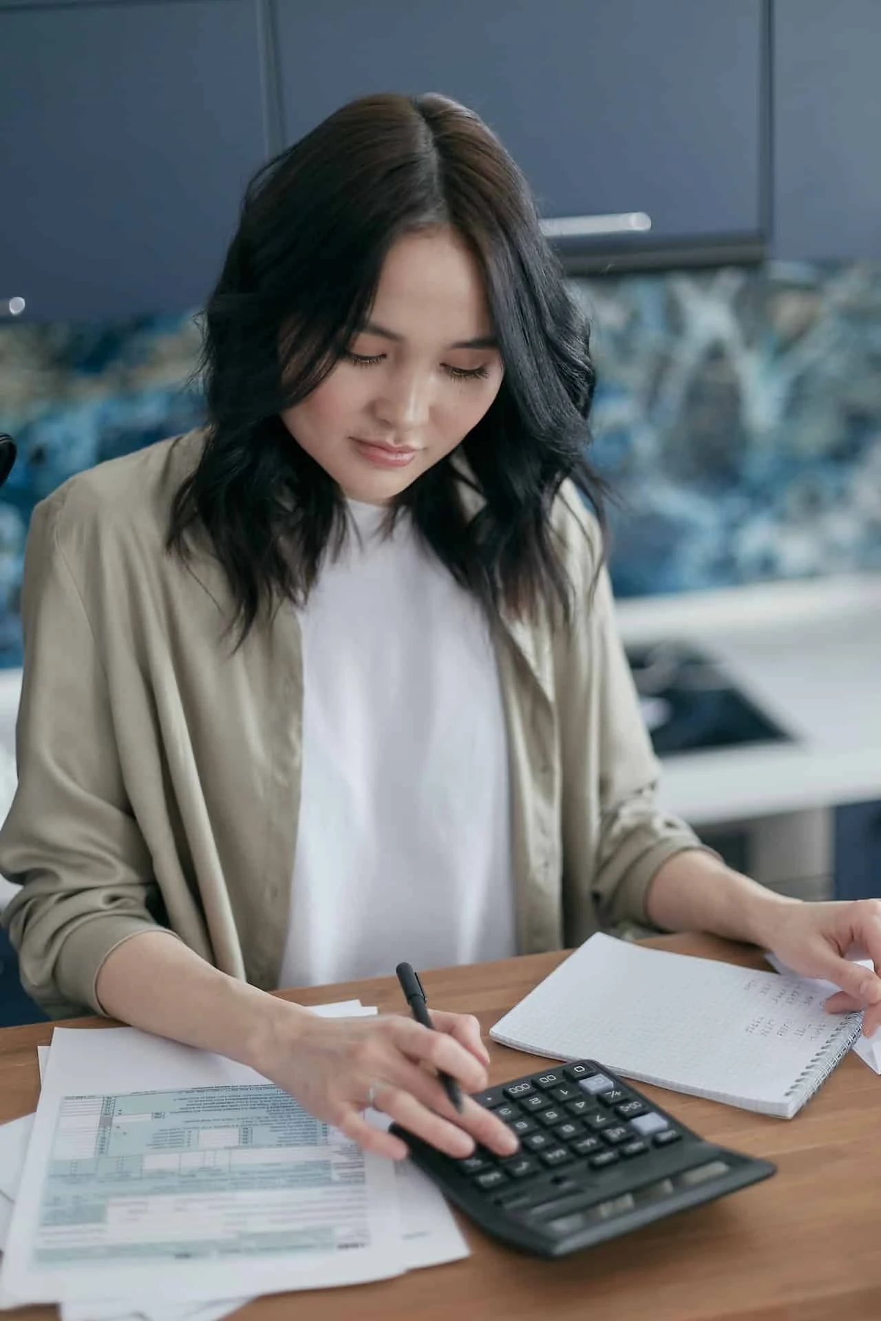 Payroll specialist reviewing financial records